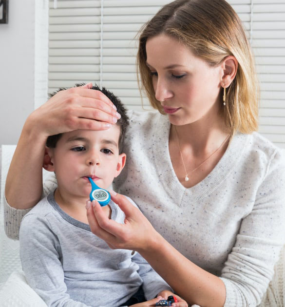 Photo of mother and daughter using Kinsa thermometer